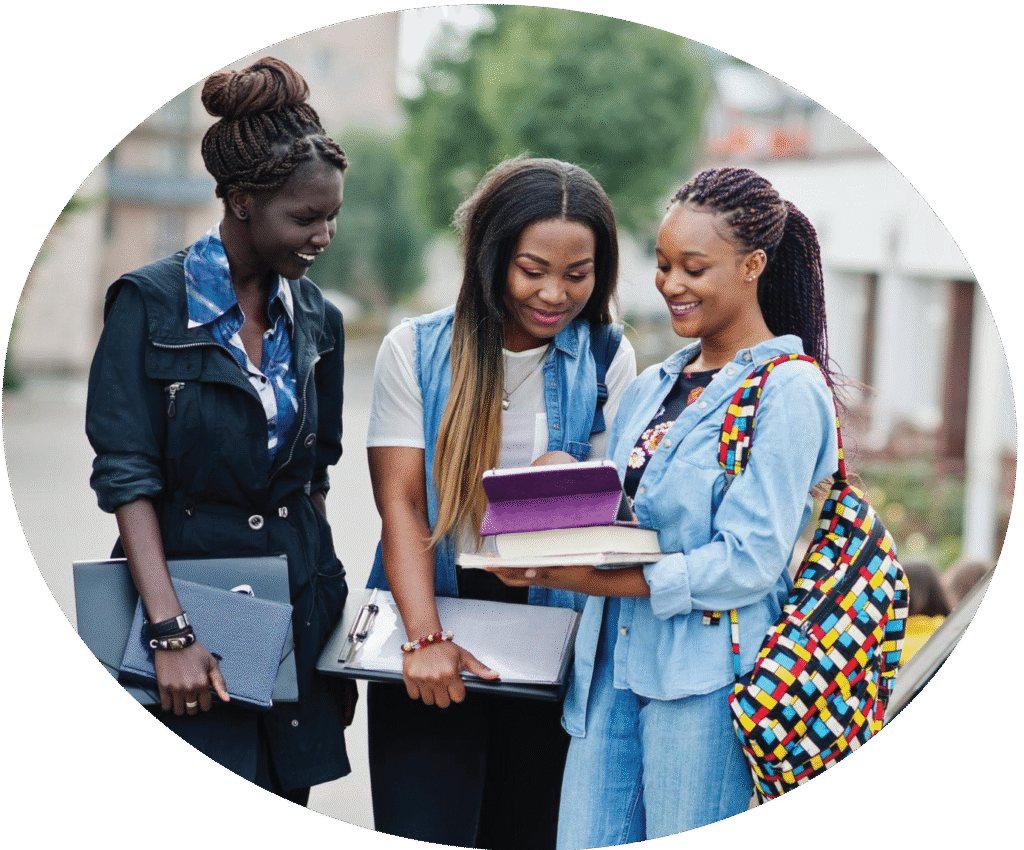 young black girls looking at a tablet